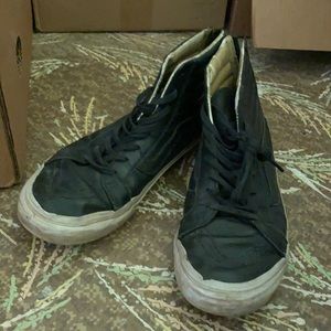 Black and gold zip up vans